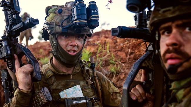 Australian Army soldier Lance Corporal Mitchell Kinsley from 1st Battalion, the Royal Australian Regiment, communicates with his team after assaulting a main defensive position during Exercise Talisman Sabre 23. Picture: LAC Ryan Howell