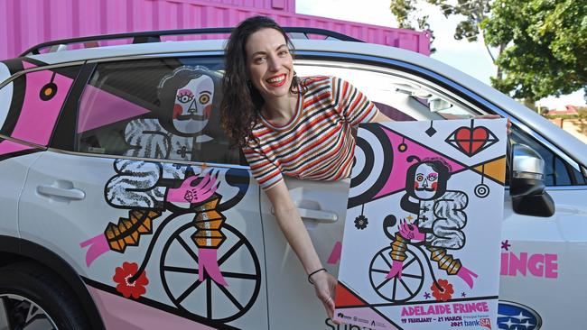 Russian-born digital illustrator Polina Tsymbal with Frederique Fringe, her winning design for the 2021 Adelaide Fringe poster. Picture: Tom Huntley