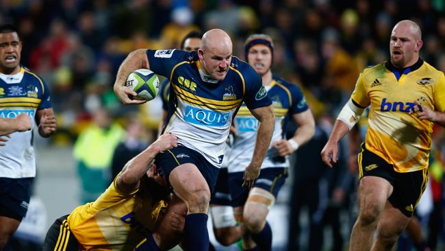 WELLINGTON, NEW ZEALAND - JUNE 27: Stephen Moore of the Brumbies is tackled during the Super Rugby Semi Final match between the Hurricanes and the Brumbies at Westpac Stadium on June 27, 2015 in Wellington, New Zealand. (Photo by Phil Walter/Getty Images)