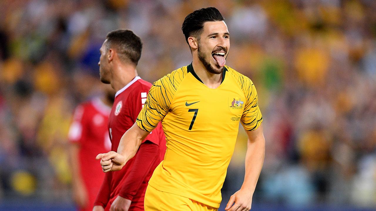 Mathew Leckie of the Socceroos celebrates after scoring a goal