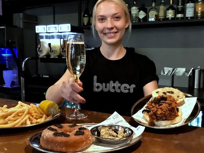 Emily Whyte serves up truffle-topped doughnuts, fried chicken along with truffle honey butter and a glass of bubbles. Picture: Jenifer Jagielski