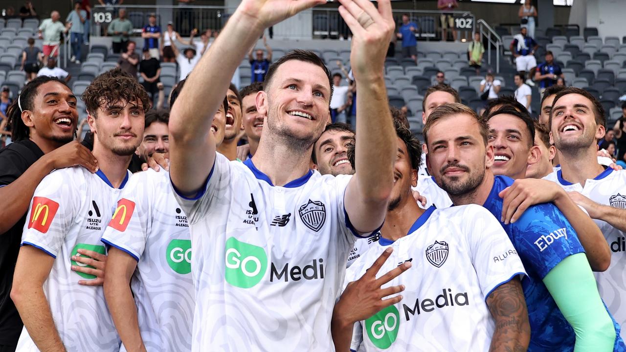 Auckland FC players celebrate their win. Photo: Brendon Thorne/Getty Images.