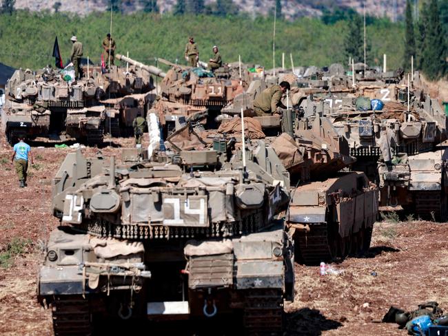 Israeli army tanks are deployed in the Upper Galilee region of northern Israel near the border with Lebanon. Picture: AFP