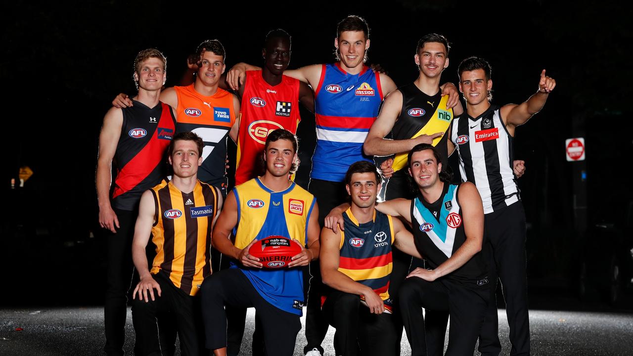 MELBOURNE, AUSTRALIA – NOVEMBER 24: (Top L-R) Ben Hobbs of the Bombers, Finn Callaghan of the Giants, Mac Andrew of the Suns, Sam Darcy of the Bulldogs, Josh Gibcus of the Tigers, Nick Daicos of the Magpies, (bottom L-R) Josh Ward of the Hawks, Campbell Chesser of the Eagles, Josh Rachele of the Crows and Josh Sinn of the Power pose for photos during the NAB AFL Draft at the London Tavern on November 24, 2021 in Melbourne, Australia. (Photo by Michael Willson/AFL Photos via Getty Images)