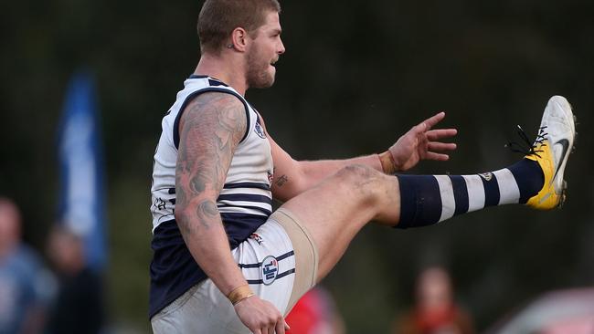 Cameron Cloke in action during his stint with Bundoora in the NFL.