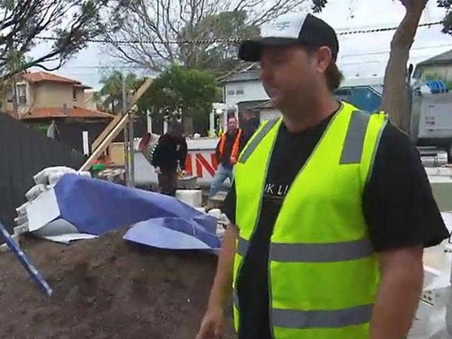 Dave Franklin has a crack at Vito when his offer to help the contestant with his landscaping goes sour. Picture: Channel 9