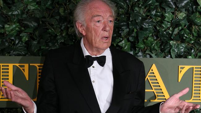 Michael Gambon poses on the red carpet as he attends the 62nd London Evening Standard Theatre Awards 2016. (Photo by Daniel LEAL / AFP)