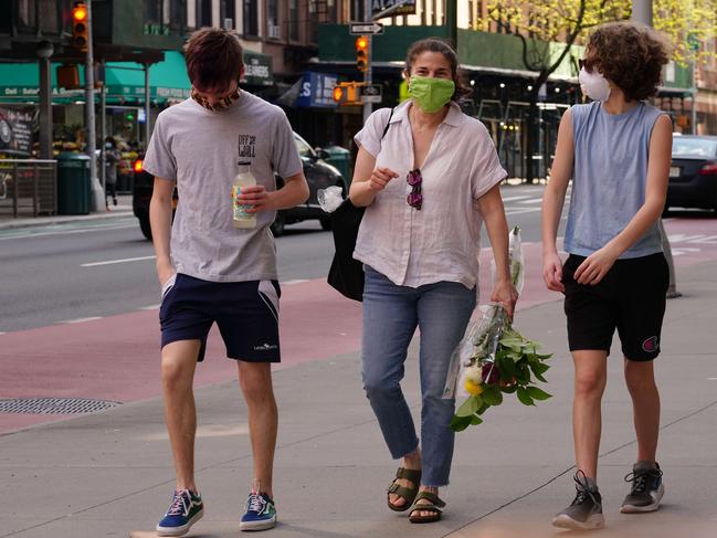 New Yorkers were out and about on the weekend as the weather warmed up. Officials are concerned people will stop wearing masks. Picture: Getty Images/AFP