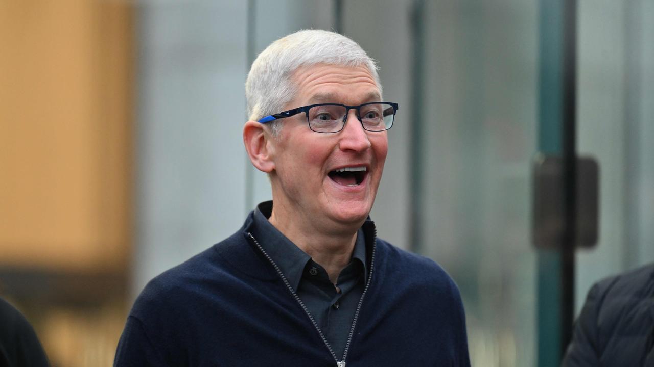 Apple CEO Tim Cook greets customers in New York City. Picture: AFP