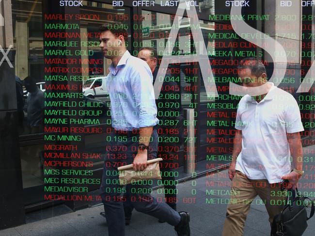 SYDNEY, AUSTRALIA - Newswire Photos -November 14, 2022 A general view of members of the public walking past the digital boards at the ASX in Sydney. Picture: NCA Newswire / Gaye Gerard