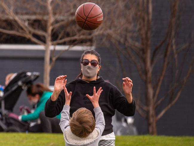 Scenes around melbourne with people out and about in masks exercising, walking dogs riding bikes around southeast melbourne. Picture: Jason Edwards