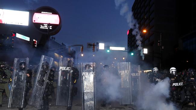 Atlanta police prepare to enforce a 9pm curfew . Picture: AP