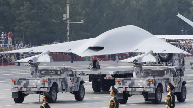 A military vehicle carries an unmanned aerial vehicles (UAV) past Tiananmen Square during the military parade marking the 70th founding anniversary of People's Republic of China. Picture: Reuters.