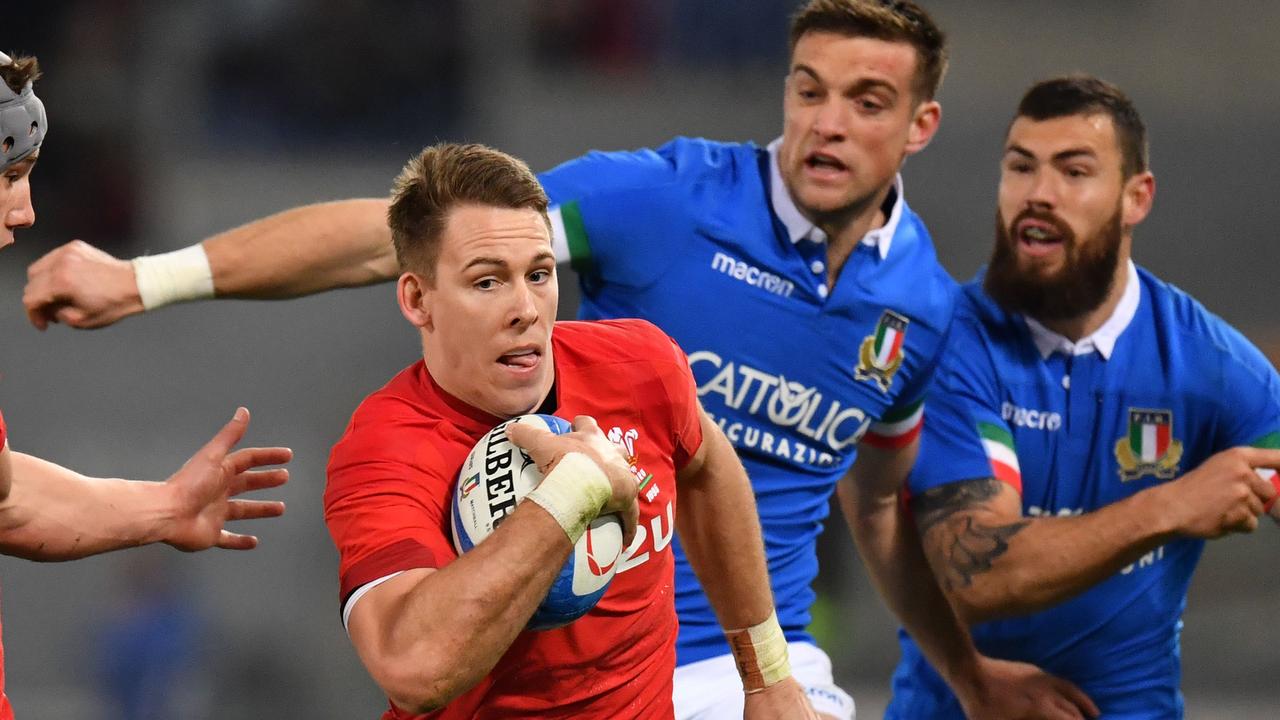 Wales winger Josh Adams runs with the ball during the Six Nations.