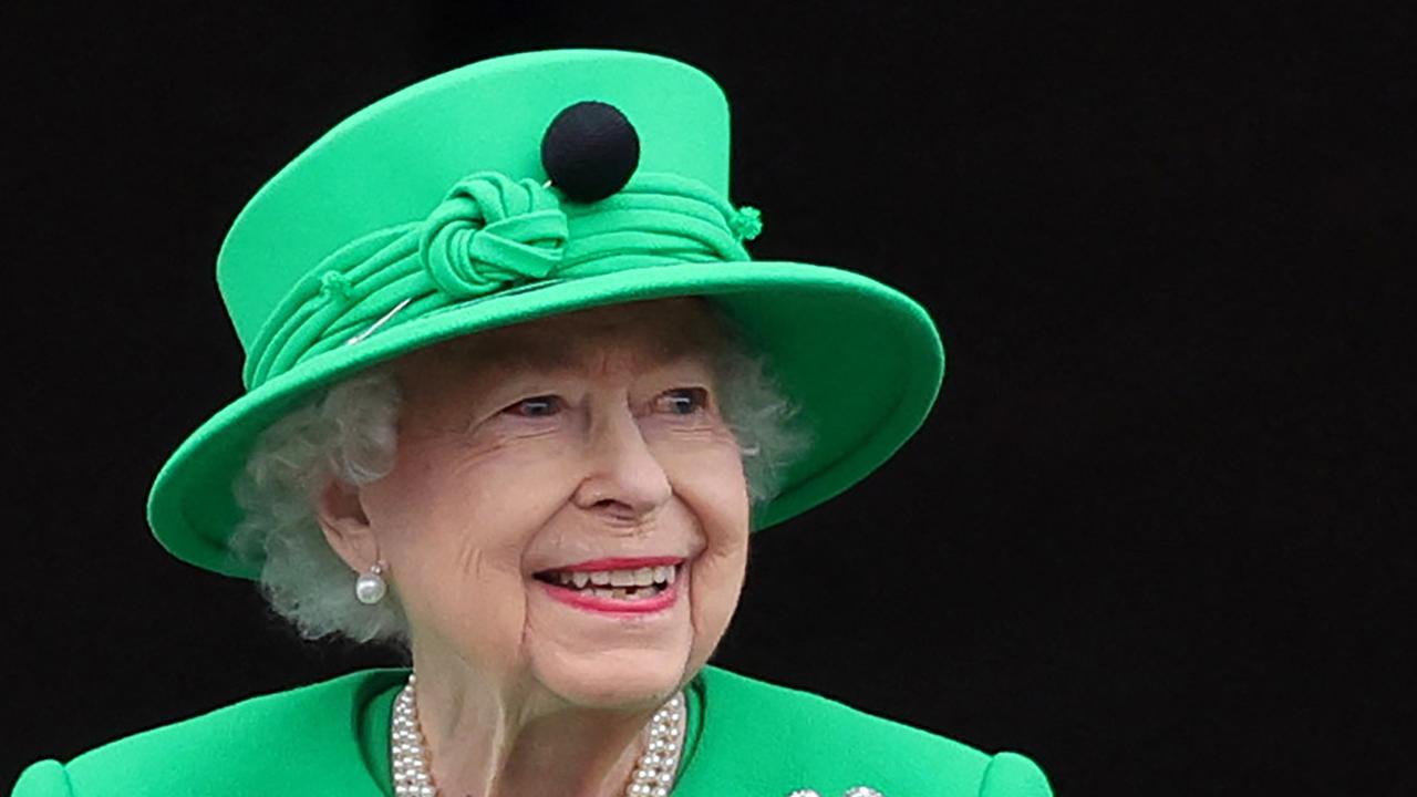 Queen Elizabeth II smiles to the crowd from Buckingham Palace balcony at the end of the Platinum Pageant in London on June 5, 2022. Picture: Chris Jackson/AFP