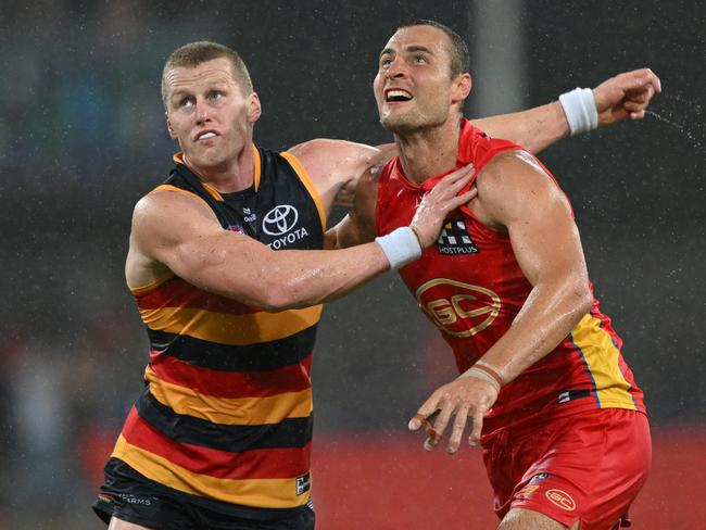 Jarrod Witts competes with Crows ruck Reilly O’Brien in round one. Picture: Matt Roberts/AFL Photos/via Getty Images