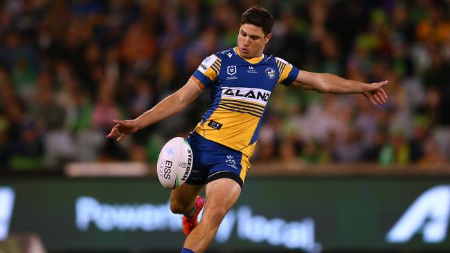 CANBERRA, AUSTRALIA - APRIL 17:  Mitchell Moses of the Eels kicks the ball during the round six NRL match between the Canberra Raiders and the Parramatta Eels at GIO Stadium on April 17, 2021, in Canberra, Australia. (Photo by Matt Blyth/Getty Images)