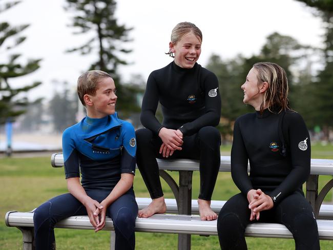 Manly Beach enthusiasts and students Kody Burrows 12, Felix Stephens 11 and Saxon Goodwin 11. Picture: Tim Hunter.