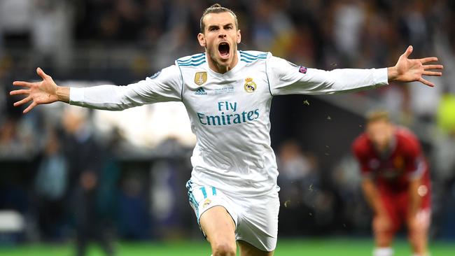 Real Madrid star Gareth Bale isn’t quite as fast as Tiger Oleg Markov. Picture: Getty Images