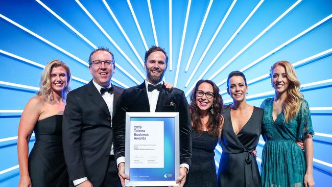 Samford business STEM Punks won the Queensland Emerging and Energised category at the 2019 Telstra Business Awards. From left: Nadia Tucker (winner in this category last year and presenter of the award), and STEM Punks staff Michael Holmstrom, Damien Aldridge, Fiona Holmstrom, Kara Griggs and Natalie Anderson.