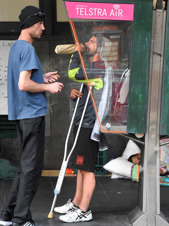 A man drinks from a bottle at 9am. Picture: Nicole Garmston