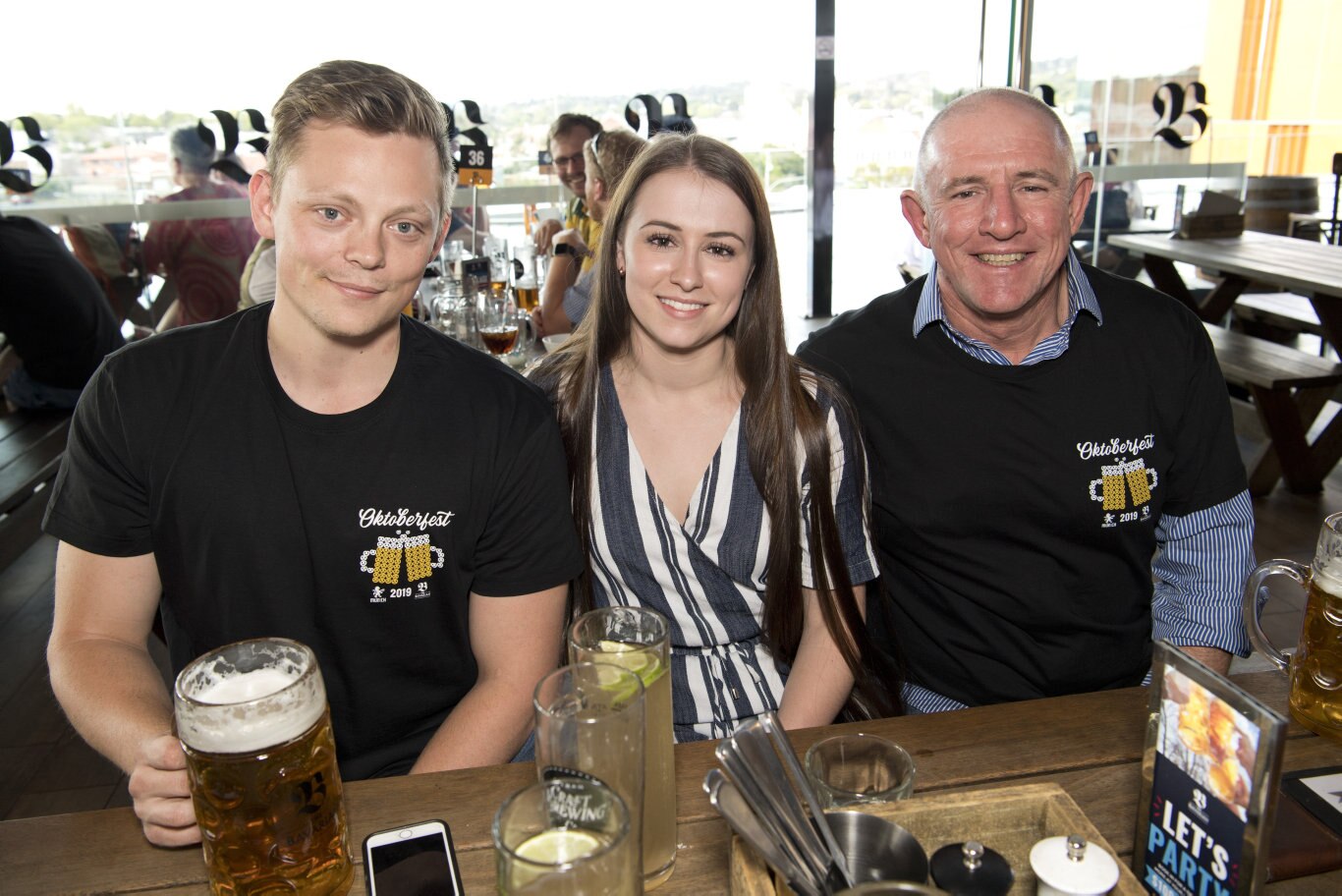 Sampling some German beer at The Bavarian Grand Central are (from left) Lachlan Panzram, Romany Boland and Peter Boland. The Bavarian Toowoomba for Oktoberfest. Saturday, 5th Oct, 2019. Picture: Nev Madsen