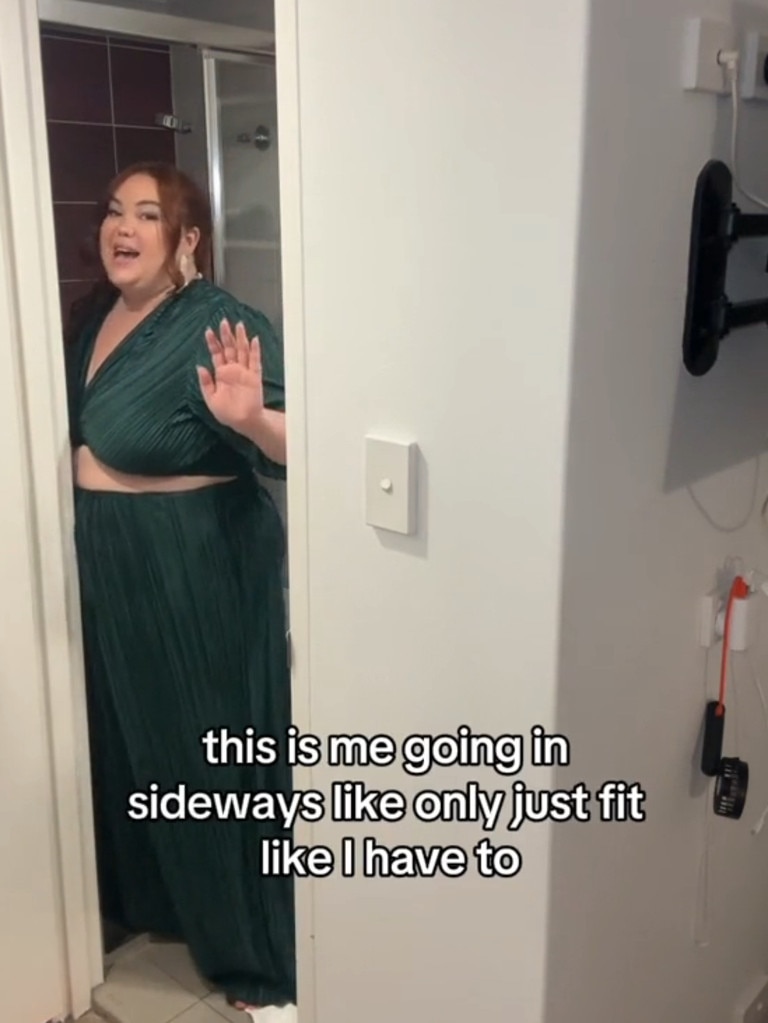 She said she could just fit into the shower by entering sideways. Picture: TikTok / @curvysam