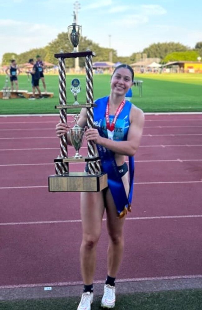 Aviva Damjanovic with the first place trophy after taking out the John Campbell Miles Memorial 100 Yards dash. Picture: Facebook.