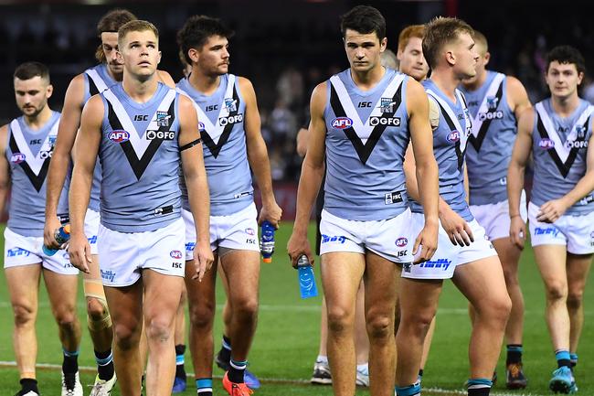 The Power look dejected after losing to the Collingwood Magpies at Marvel Stadium. Picture: Quinn Rooney/Getty