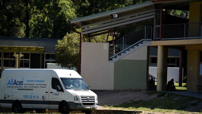 Cleaning Staff at Helensvale State School on Saturday. Picture: Steve Holland.