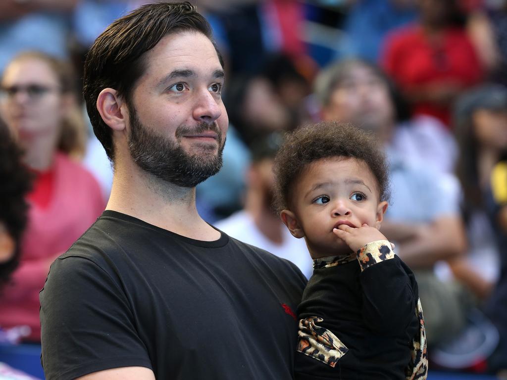 Alexis Ohanian holds Alexis Olympia Ohanian Jr.