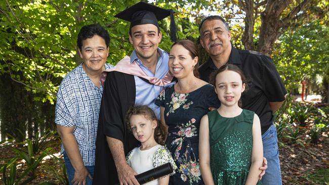 Master of Education (Guidance and Counselling) graduate Leland Palmer celebrates with (from left) Carlette, Lucy, Leesa, Lola and Kurt Palmer at a UniSQ graduation ceremony at The Empire, Tuesday, October 29, 2024. Picture: Kevin Farmer