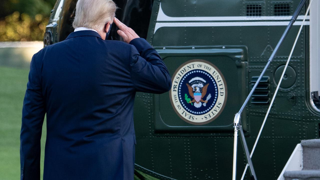 Donald Trump boarding Marine One today. It took him to Walter Reed Medical Centre. Picture: Saul Loeb/AFP