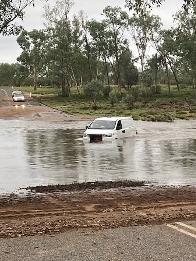 Hermannsberg Police responded to a report of a vehicle stranded in flood waters in Ellery Creek, 12km east of Hermannsberg. Picture: NTPFES