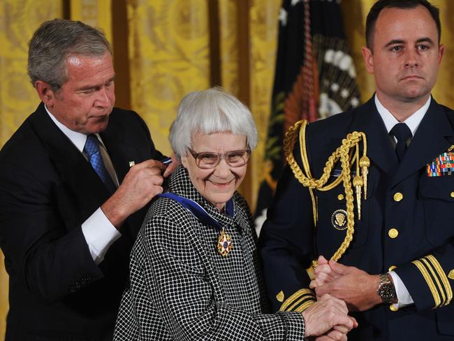 Honoured ... US President George W Bush (L) presents the 2007 Presidential Medal of Freedom to novelist Harper Lee, author of book To Kill A Mockingbird in 2007. Picture: Supplied