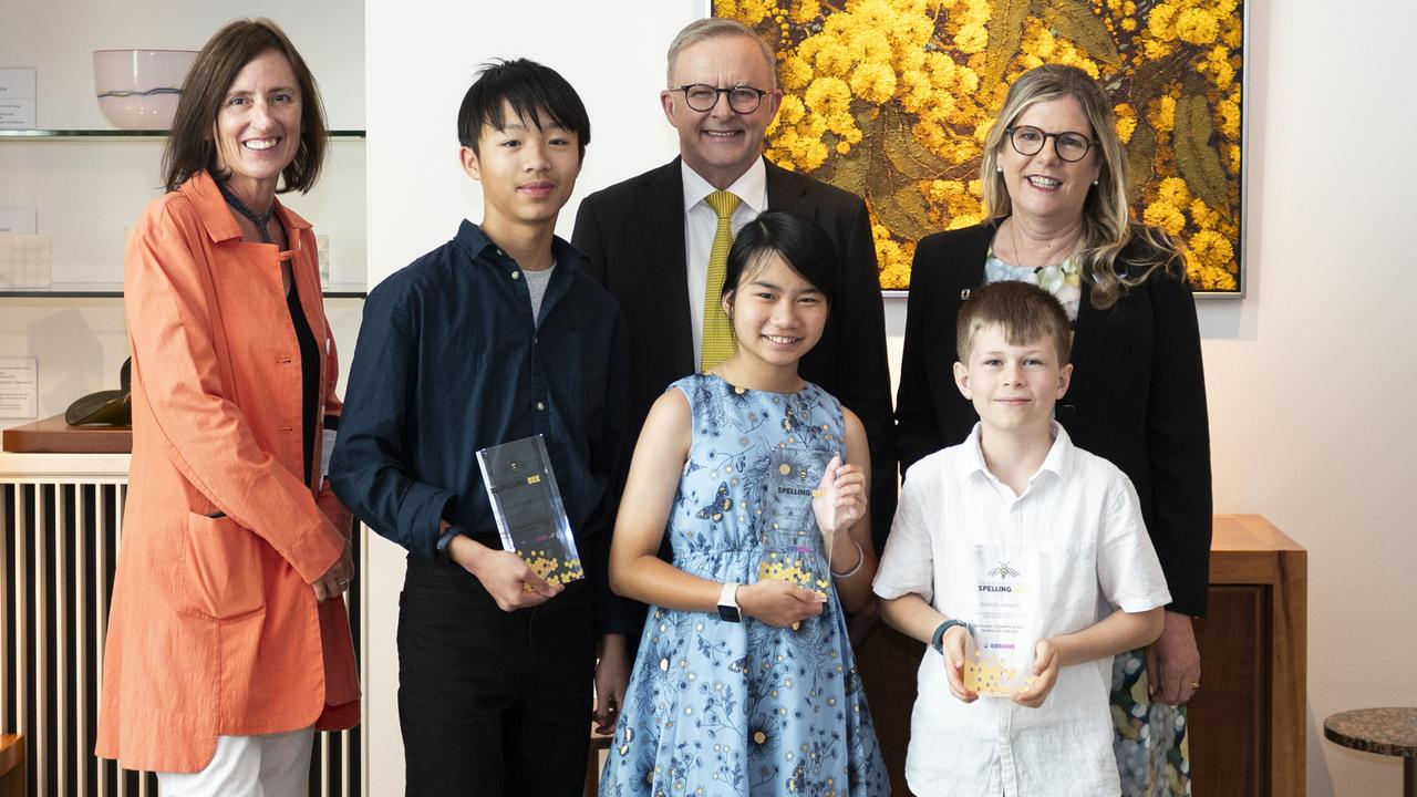 Prime Minister Anthony Albanese with the Spelling Bee national champions (from left) Zachary Cheng, 14 (Years 7-8 Red winner); Abigail Koh, 12 (Years 5-6 Orange winner) and Samuel Wright, 9 (Years 3-4 Green winner) along with Kids News editor Di Jenkins (far left) and News Corp Australia community ambassador Penny Fowler: Picture: NCA NewsWire / Martin Ollman