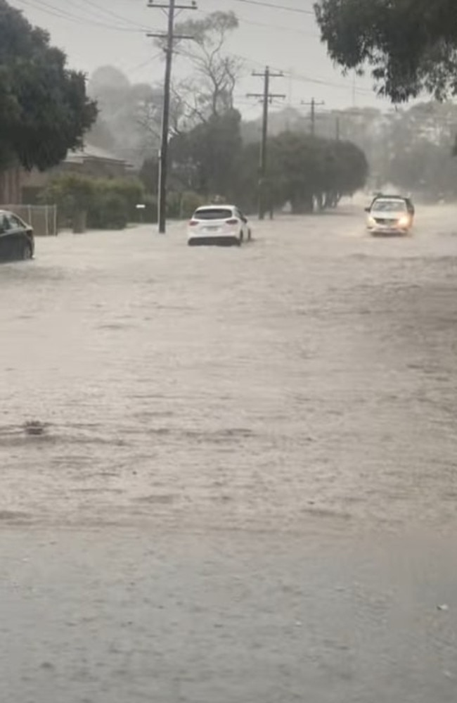 Cars on the flooded Torquay Highway. Picture: Facebook/Rhiannon Blackney