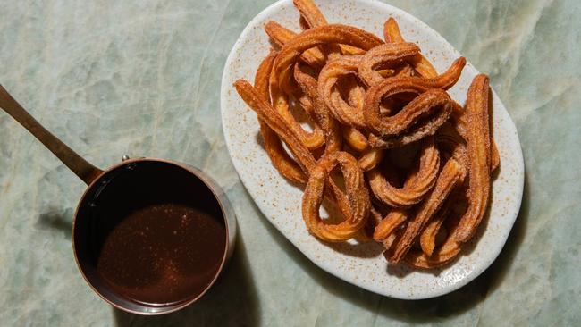 Churros and chocolate. Picture: Nikki To