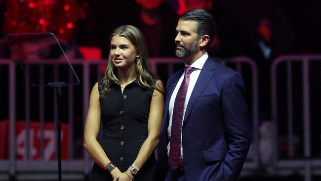 Donald Trump Jr. and his daughter Kai Madison Trump on stage at Donald Trump's victory rally in Washington, January 19. Picture: Scott Olson/Getty Images/AFP