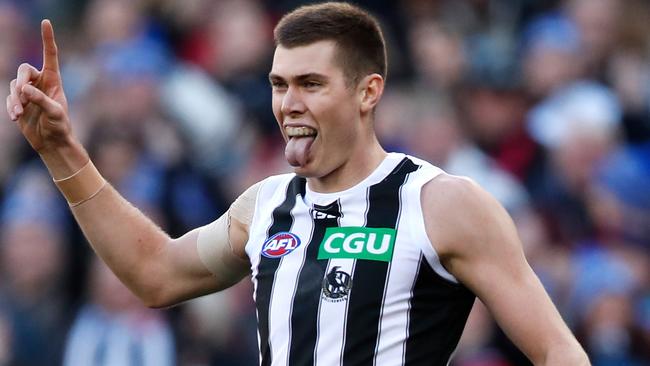 MELBOURNE, AUSTRALIA — JUNE 11: Mason Cox of the Magpies celebrates a goal during the 2018 AFL round 12 match between the Melbourne Demons and the Collingwood Magpies at the Melbourne Cricket Ground on June 11, 2018 in Melbourne, Australia. (Photo by Adam Trafford/AFL Media/Getty Images)