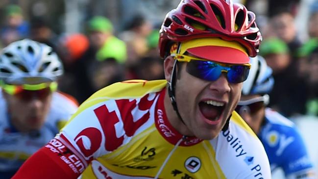 (FILES) This file photo taken on February 1, 2015 shows Belgian cyclist Antoine Demoitie crossing the finish line for the 36th "Grand Prix de la Marseillaise" cycling race on February in Marseille, southeastern France. Belgian cyclist Antoine Demoitie, 25, died after he was struck by a motorbike following a fall during the Gent-Wevelgem race in Belgium on March 27, 2016, police said. / AFP PHOTO / ANNE-CHRISTINE POUJOULAT