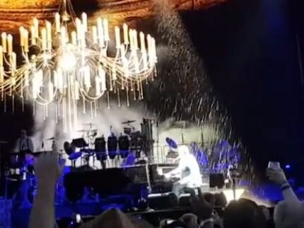 Elton John plays during torrential rain at a concert in the Yarra Valley on January 31, 2020. Picture: Instagram/@himuratz