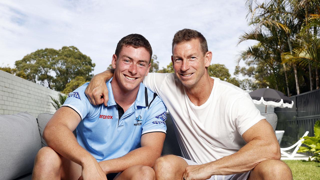 Former Sharks legend Adam Dykes (R) with his son, Kade (L). Picture: Tim Hunter.