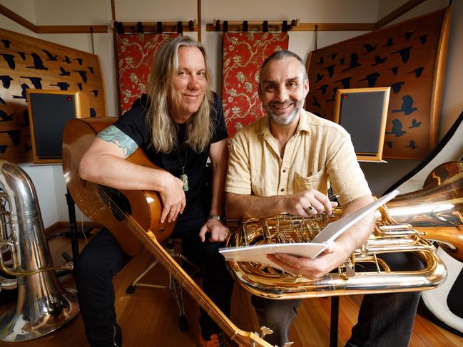 Violent Femmes bass player Brian Ritchie with TSO principal tuba player Tim Jones. The TSO collaborated with the Violent Femmes for Mona Foma in 2018. Picture: Peter Mathew