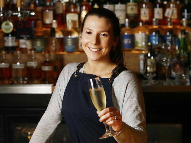 Emily Gardam serving a champagne at The Den in Salamanca. Picture: MATT THOMPSON