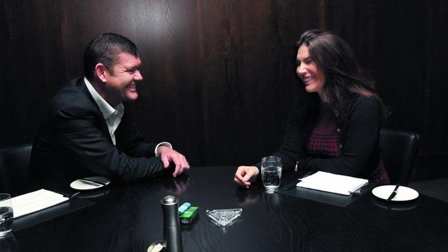 James and Gretel Packer are all smiles for the cameras at Sydney’s Rockpool restaurant in October 2017. Picture: Richard Dobson