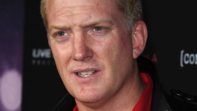 (FILES) This file photo taken on February 2, 2017 shows "Queens of the Stone Age" frontman Josh Homme attending the premiere of 'Eagles of Death Metal' at the Avalon Theatre in Los Angeles, California. Homme apologized on December 10, 2017, as he came under fire for kicking a press photographer, who said she spent the night in the hospital. The rock guitarist and vocalist was playing Saturday in Los Angeles at an annual holiday festival of radio station KROQ when video shows him slamming his foot into the face of a photographer in the pit next to the stage.  / AFP PHOTO / Mark RALSTON