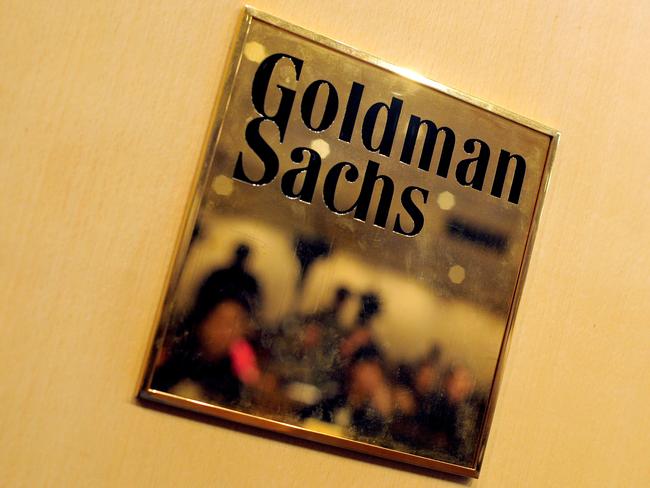 (FILES) This file photo taken on November 15, 2009 shows a plaque for investment banking giant Goldman Sachs in Hong Kong. US regulators fined Goldman Sachs $120 million December 21, 2016 for attempting to manipulate a widely-used global interest rate benchmark to benefit its trading positions. Goldman Sachs traders between 2007 and 2012 deliberately timed and priced trades to influence the published price of the benchmark interest rate, the US Commodities Futures Trading Commission said in a statement. / AFP PHOTO / RICHARD A. BROOKS