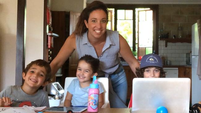 Deputy Mayor Tegan Swan working from home and schooling her children Tasman (5), Evelyn (2) and Lincoln (9).