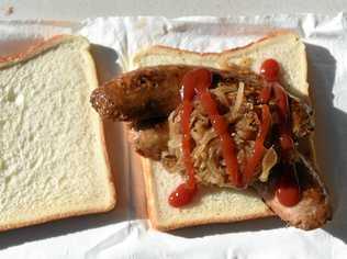 A sausage sandwich, a staple of any Australian barbecue. Picture: PAUL MILLER